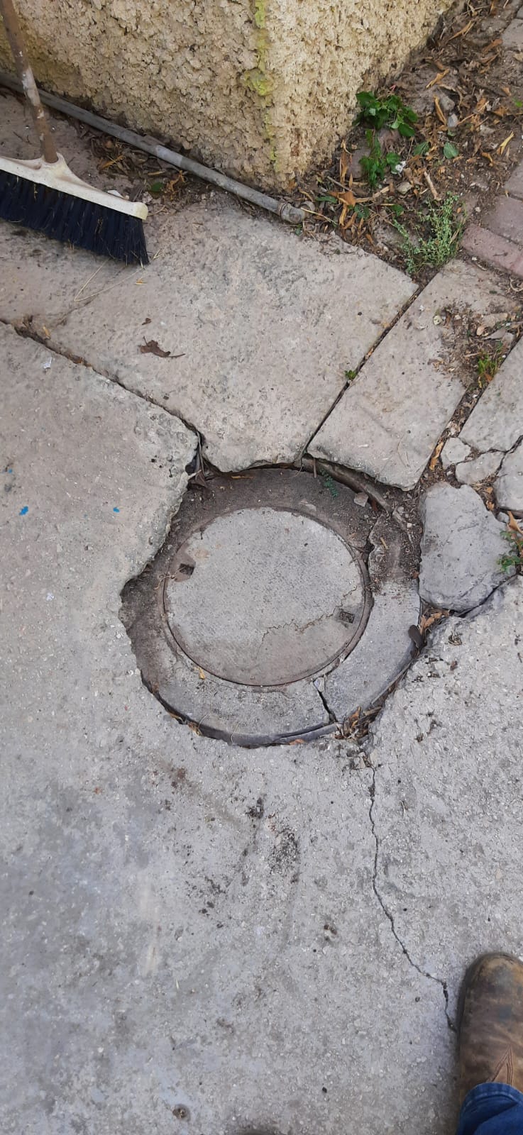 תיקון שקיעה של שוחה בחנייה